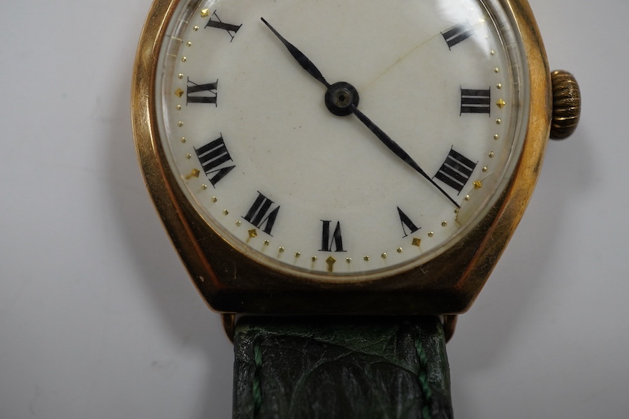 A gentleman's 1950's 9ct gold manual wind wrist watch, with Roman dial, signed Rolex movement, with Aaron Lufkin Dennison case, case diameter 29mm, on an associated leather strap. Condition - poor